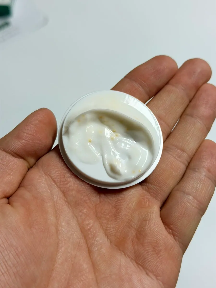 Capsule cream formula scooped out with a spatula