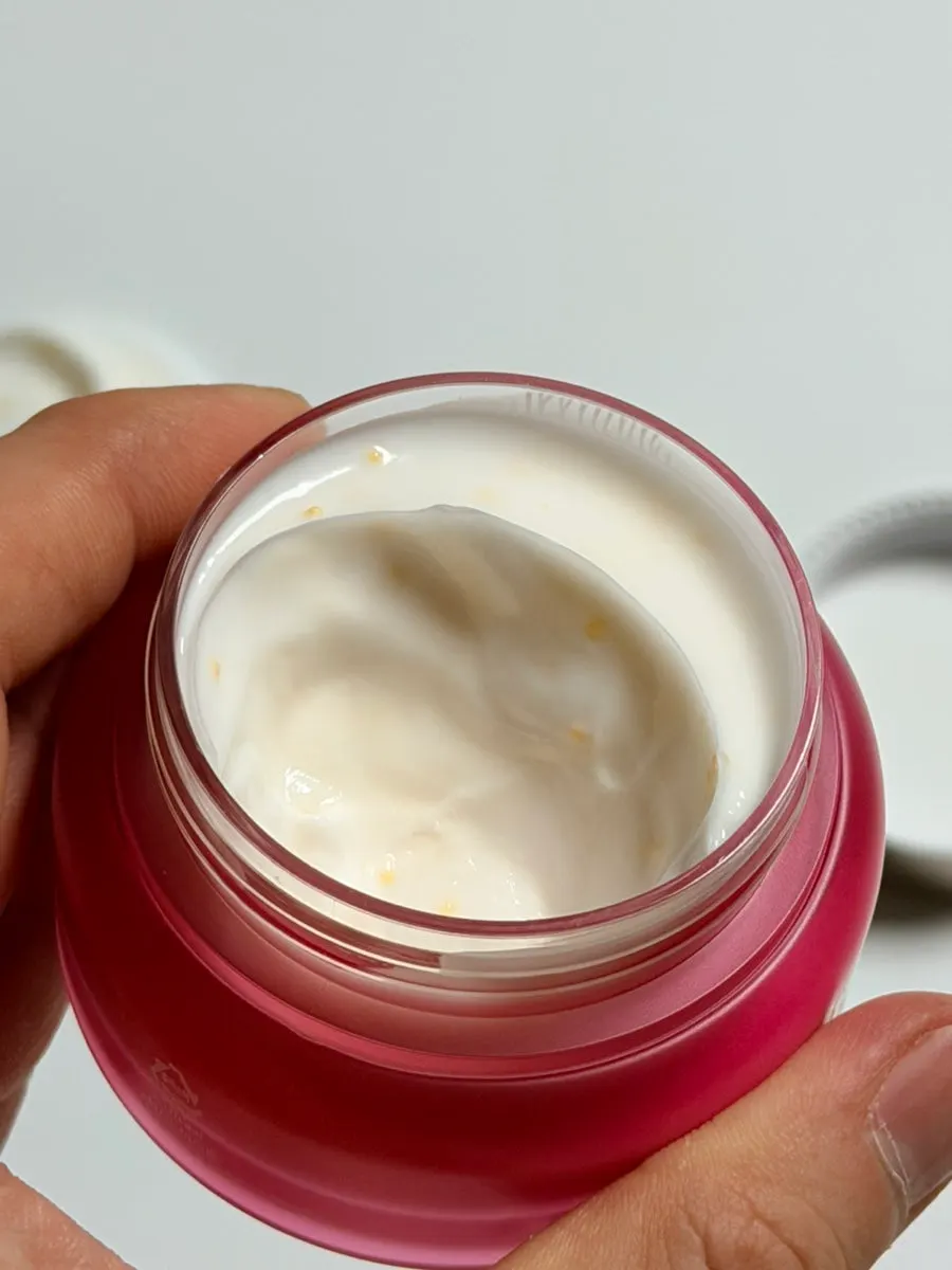 Capsule cream being spread onto skin