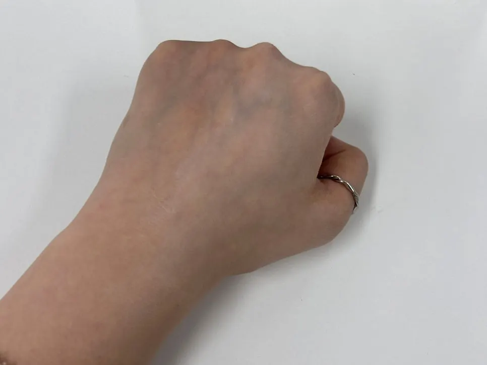 Tone-up milk applied to damp skin