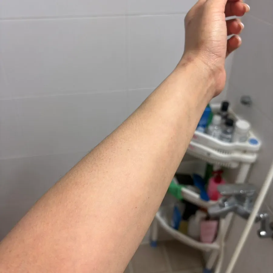 Applying tone-up milk by hand