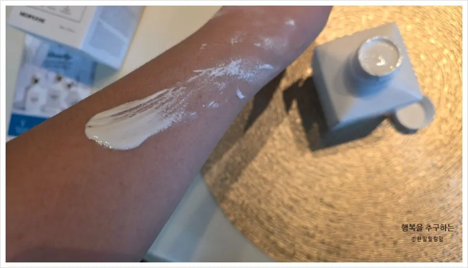 Applying tone-up milk to the body after a shower