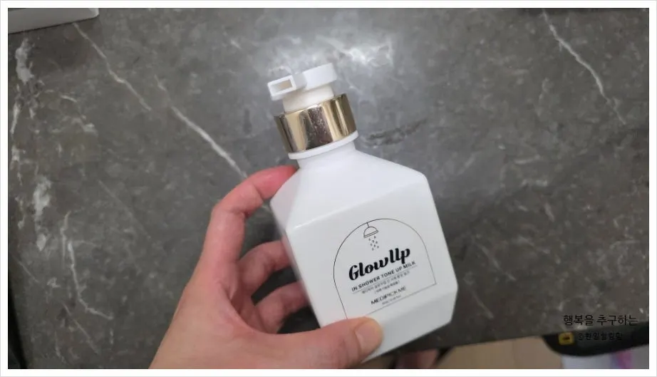Applying tone-up milk to the face