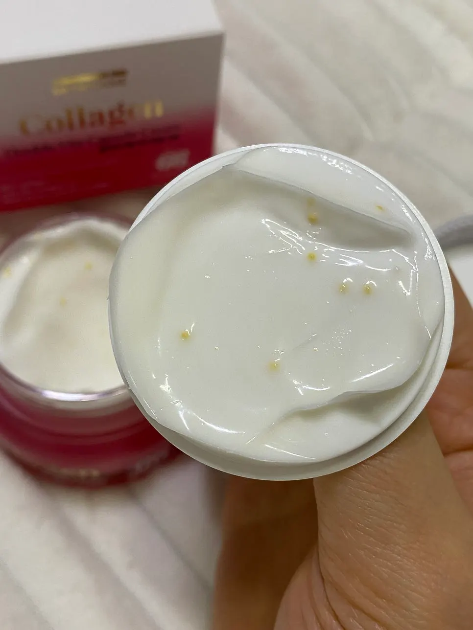 White cream with yellow capsule beads