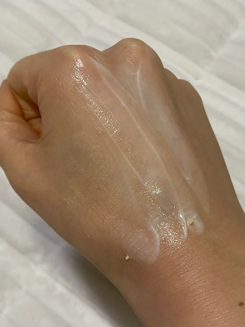 Collagen capsule cream applied after popping the beads