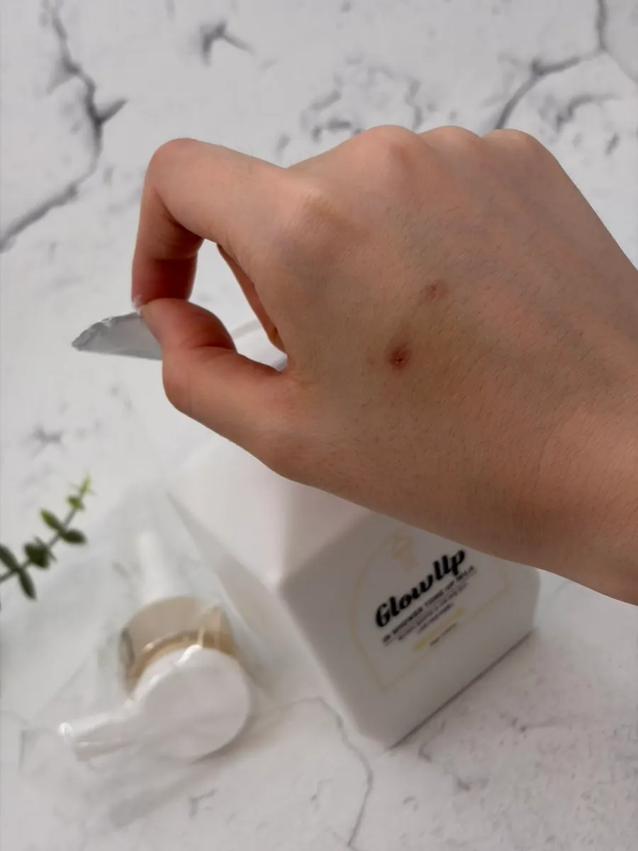 A tone-up milk bottle filled with product
