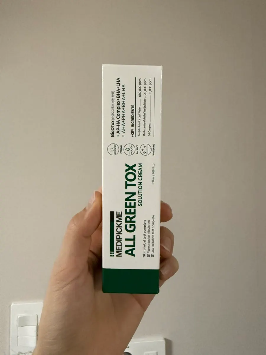 Cream product in white and green packaging