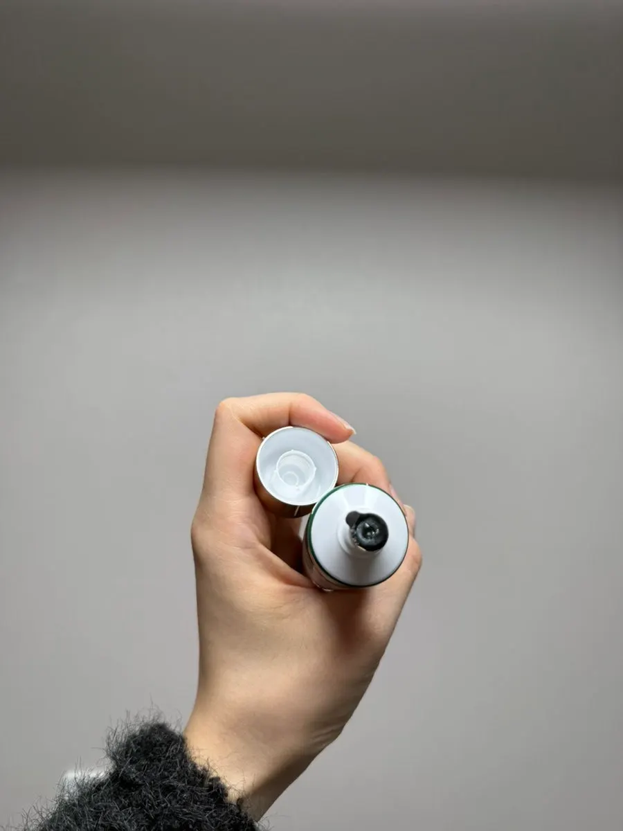 Cream product packaging with ingredient information visible