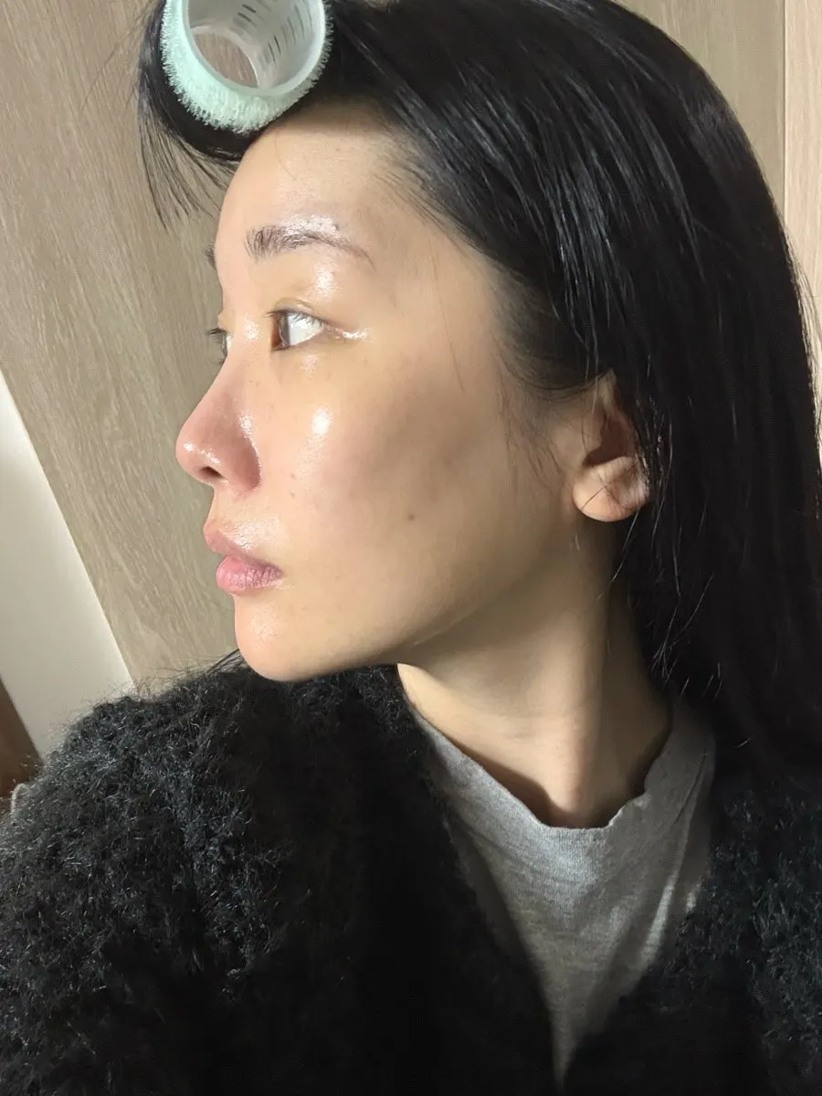Applying cream to the face