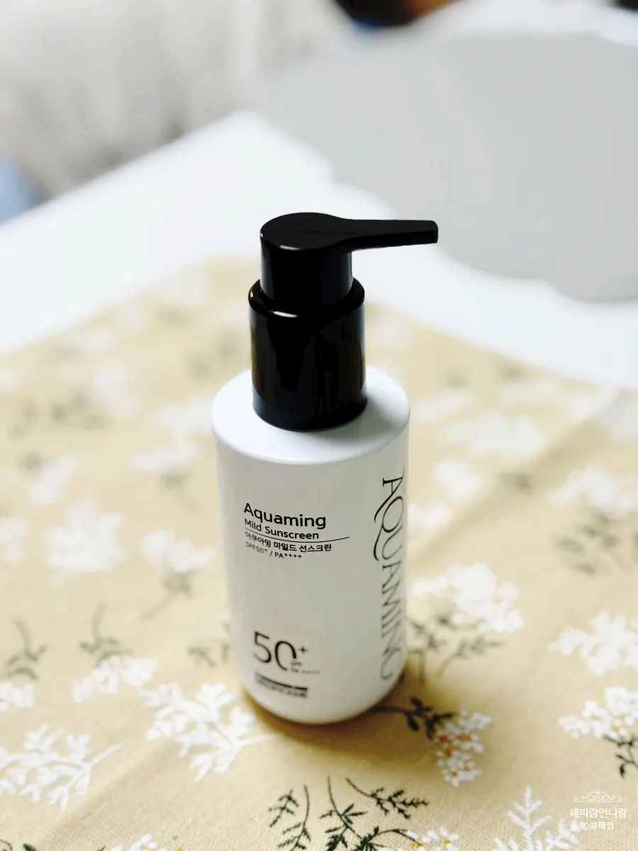 White-toned pump sunscreen bottle