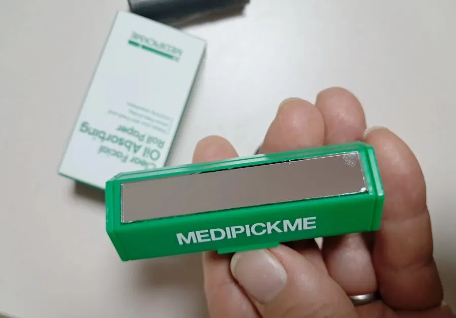 Oil blotting paper carried in a bag