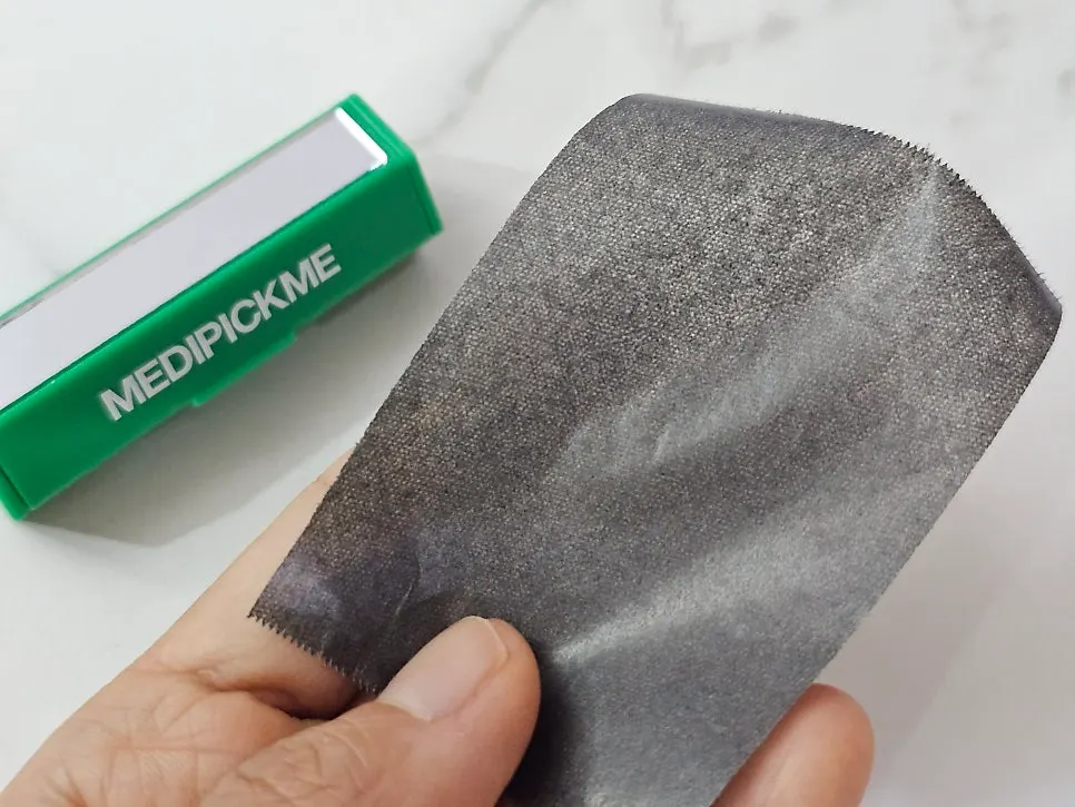 Double-sided roll oil blotting paper