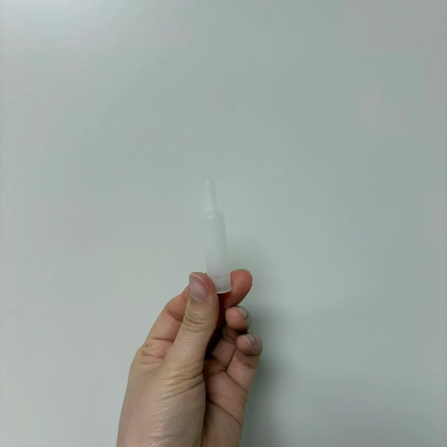Ampoule container opened by folding back its cap