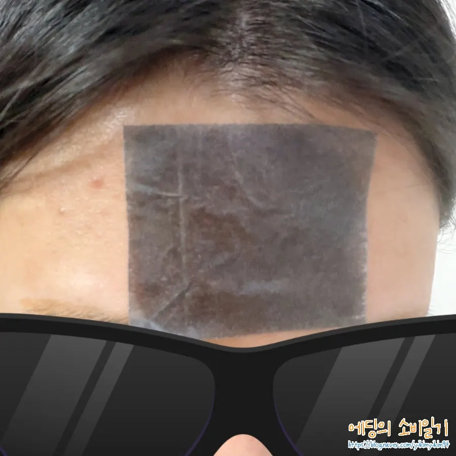 Using a cut piece of roll blotting paper