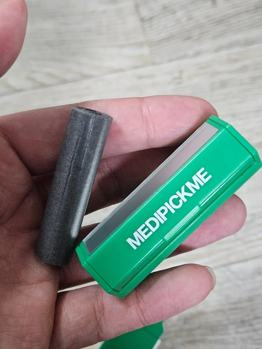Oil blotting paper used over makeup