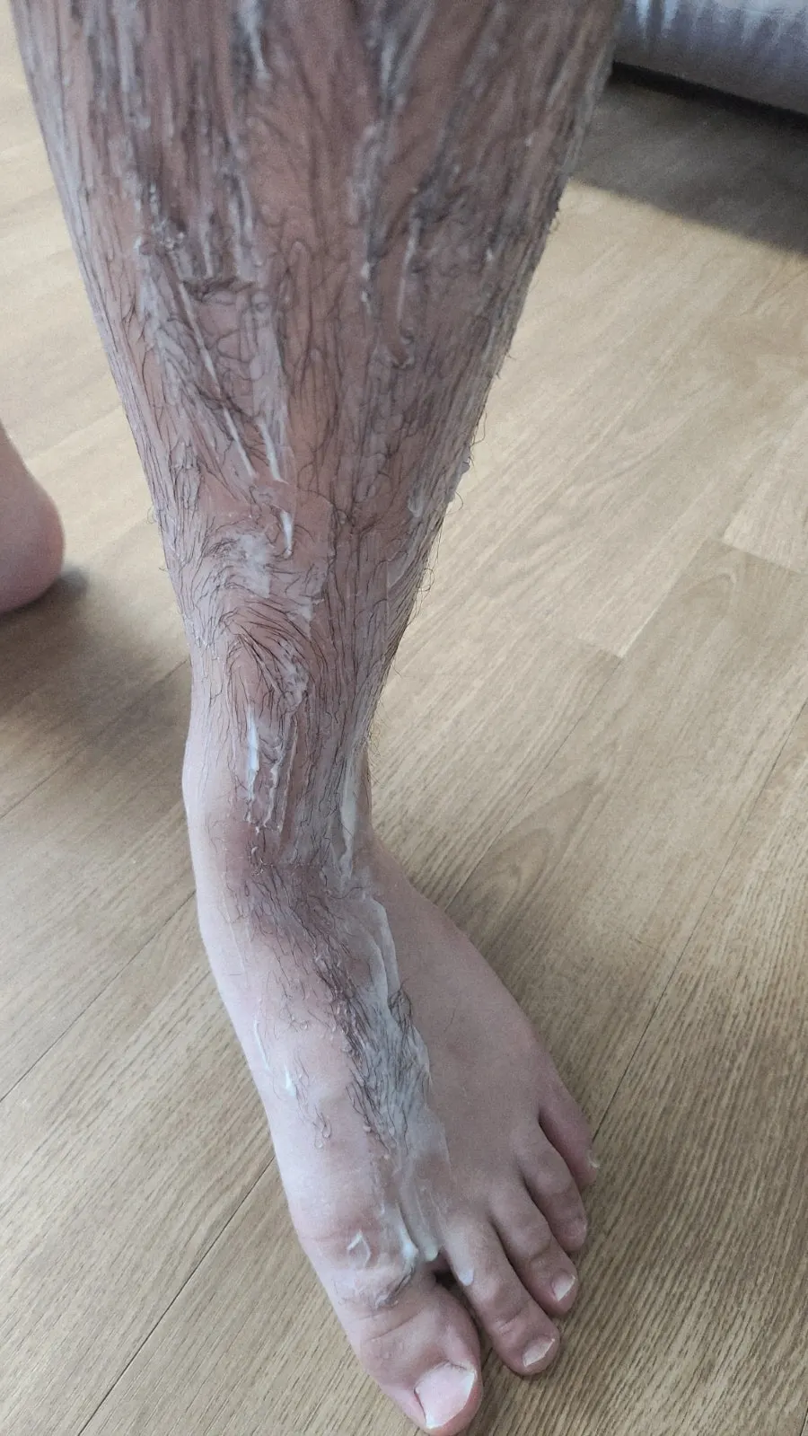 Holding the self-waxing hair removal cream