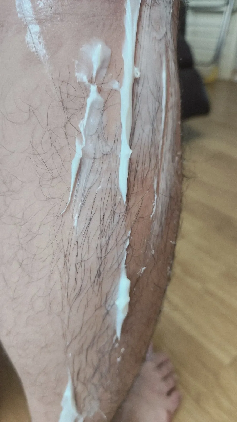 Hair removal cream tube with silicone tip attached