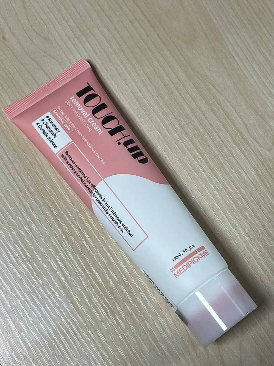 MEDIPICKME hair removal cream tube held in hand