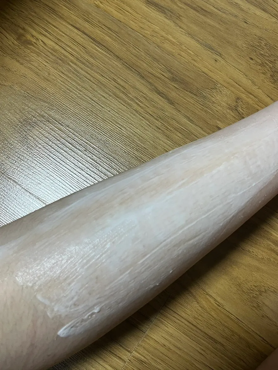 Leg waiting after hair removal cream application