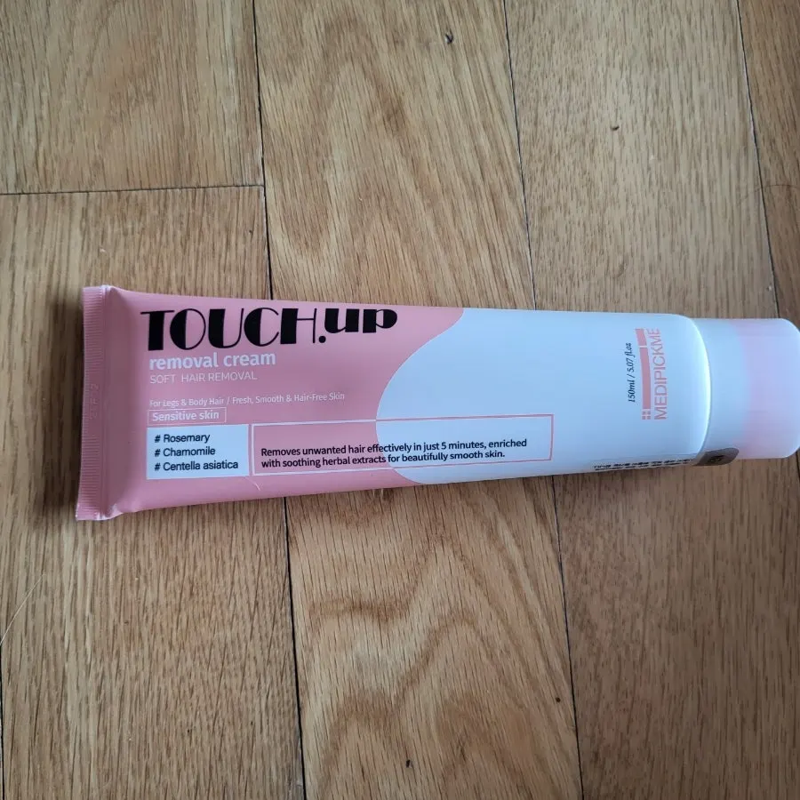 Hair removal cream container and contents