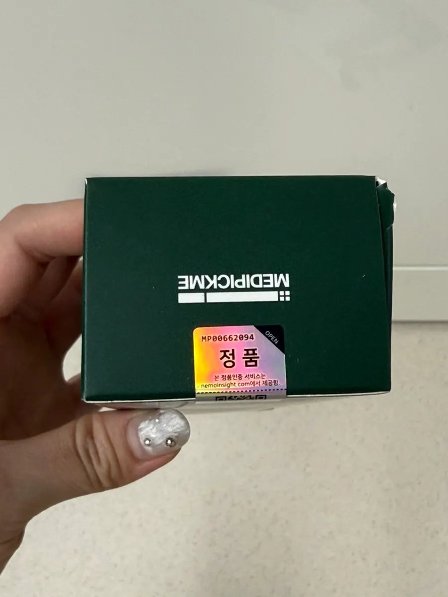 Product box with an authenticity-verification hologram