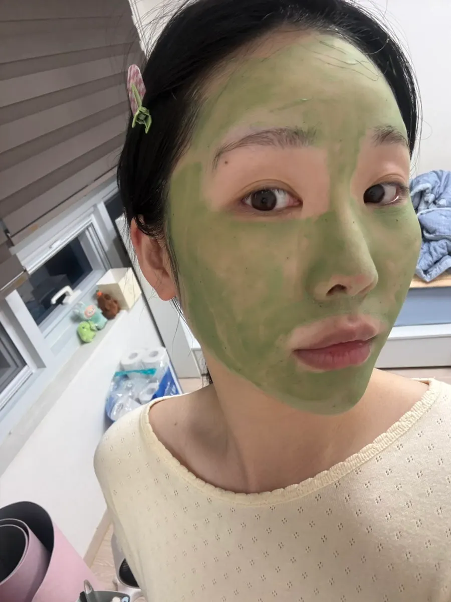Green-tinted mask applied to the face