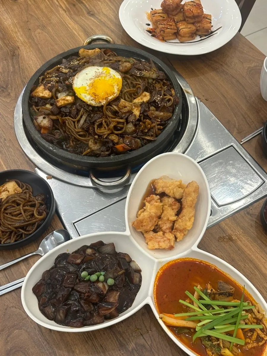 Table spread of dishes ordered at Mayway