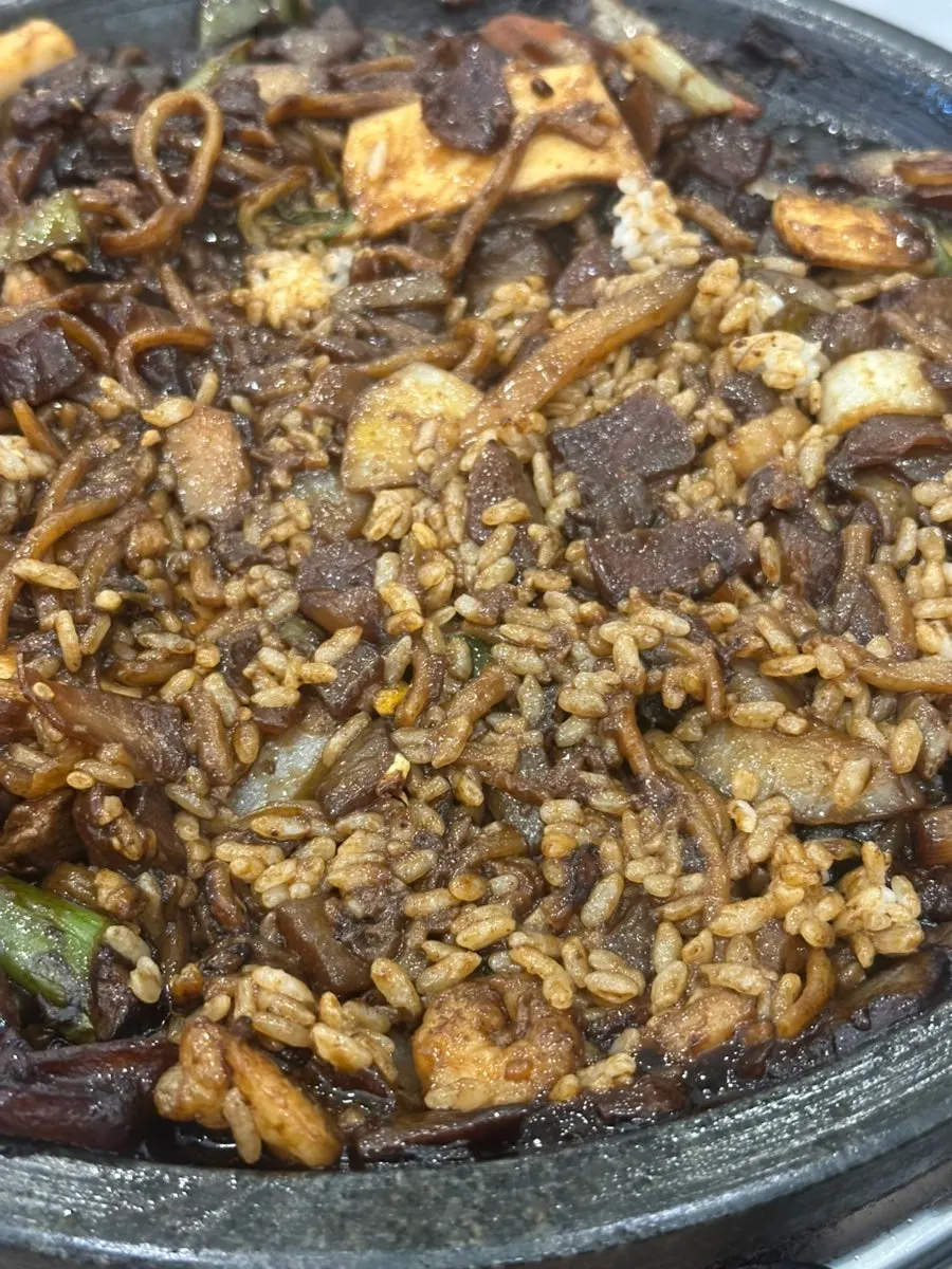 House-made jjajang noodles topped with scallion kimchi