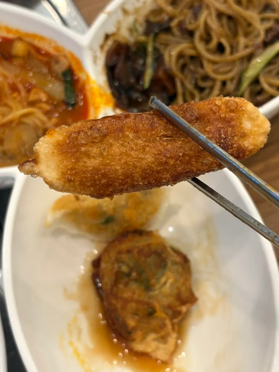 Plate of three types of pan-fried dumplings