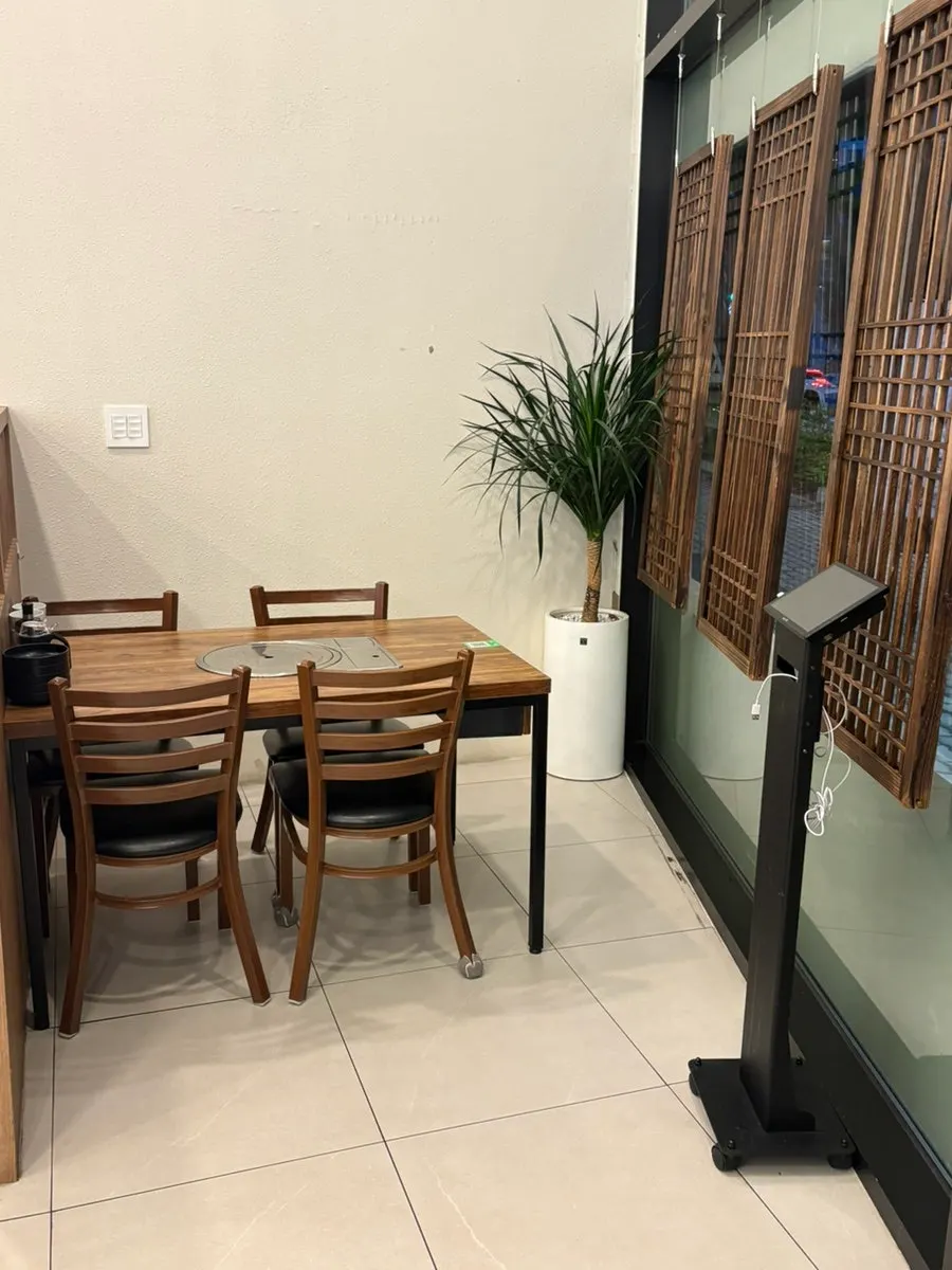Partitioned seating area inside Mayway