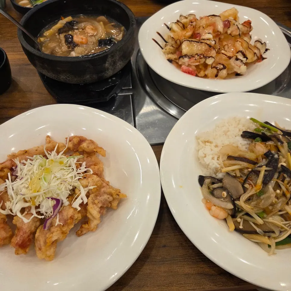 Full spread with seafood nurungji soup, grapefruit cream shrimp, and yusanseul-bap