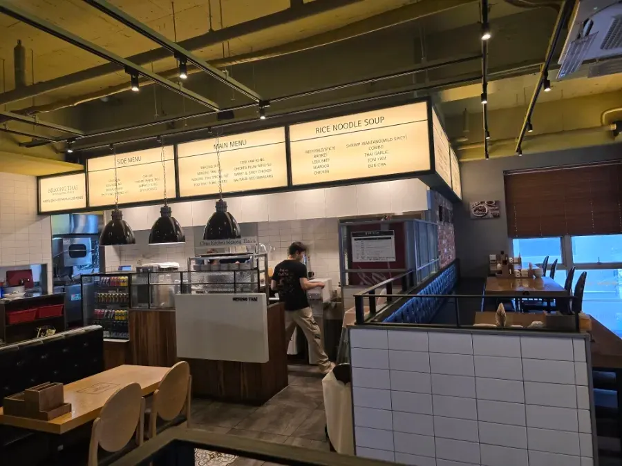 Window-side seating separated by stairs