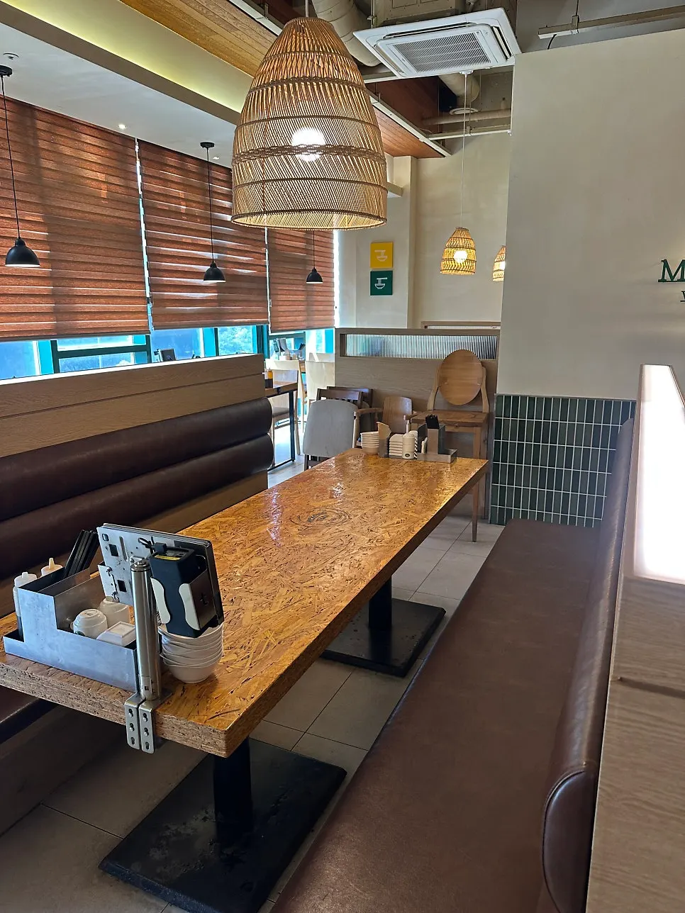 Seating area at Mekong Thai with rattan lighting
