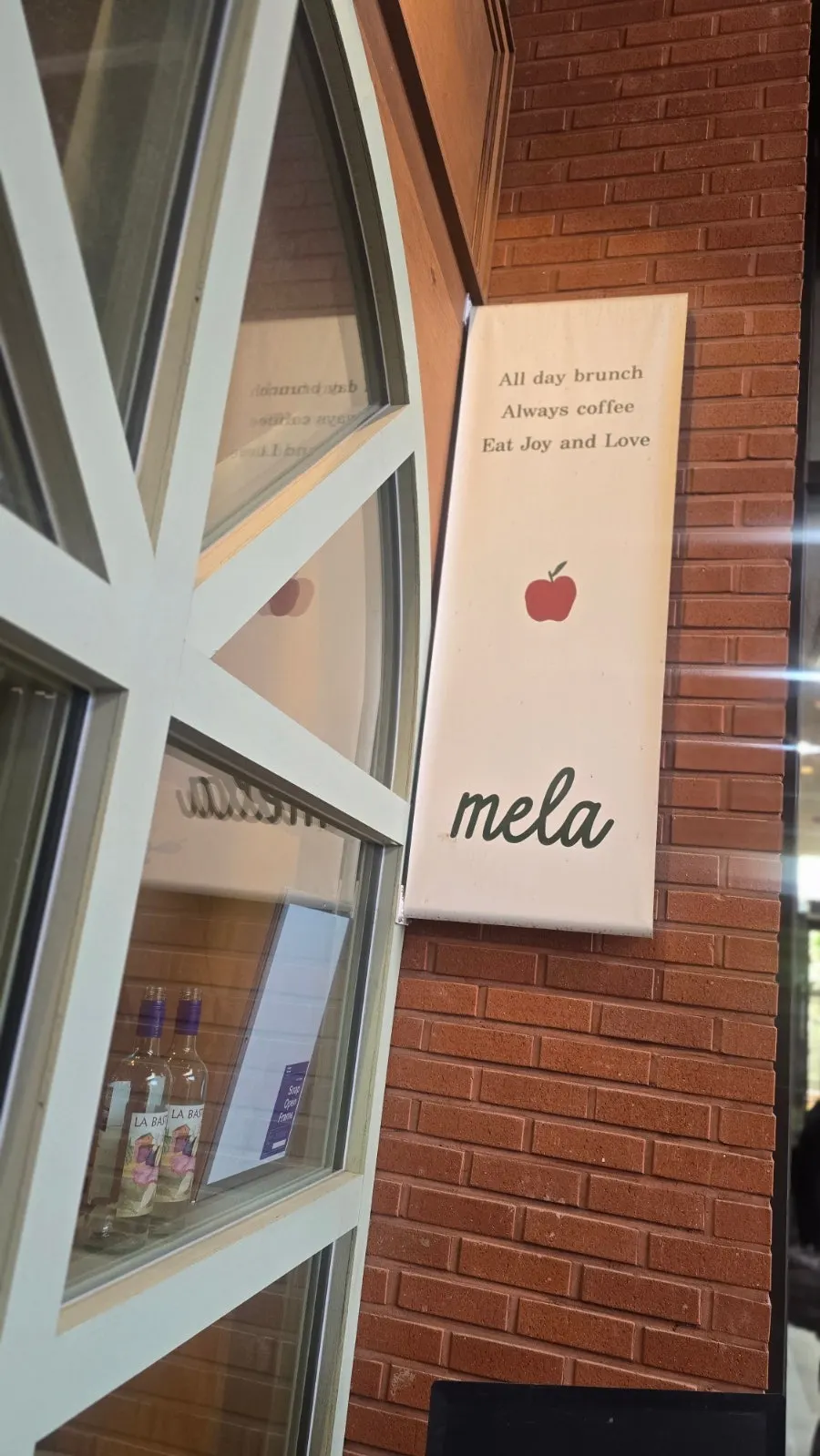 Entrance to MELA Hongdae on the first floor of the Nudit Hongdae building
