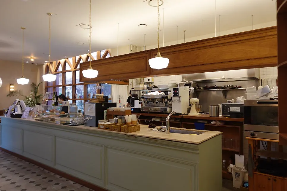Interior of MELA Hongdae with large tables for group guests