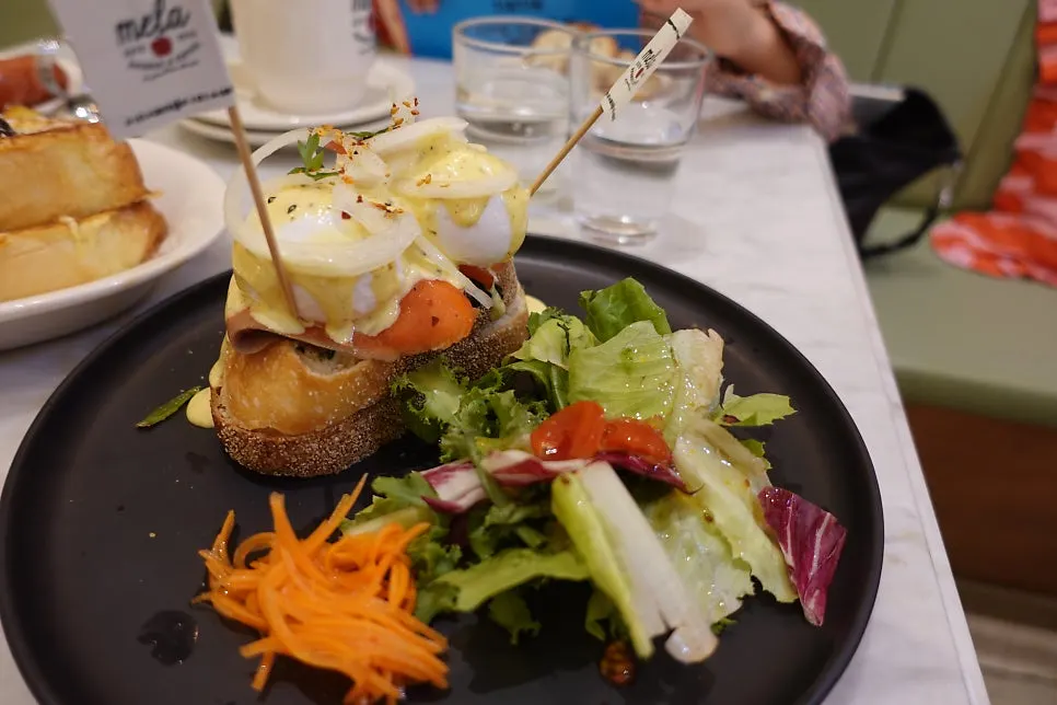 Salmon eggs Benedict topped with two poached eggs