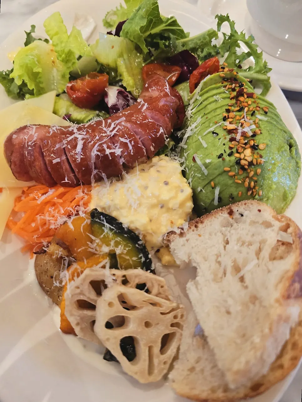 Signature brunch plate filled with fresh vegetables