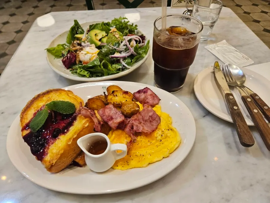 Table set with French toast and salad together
