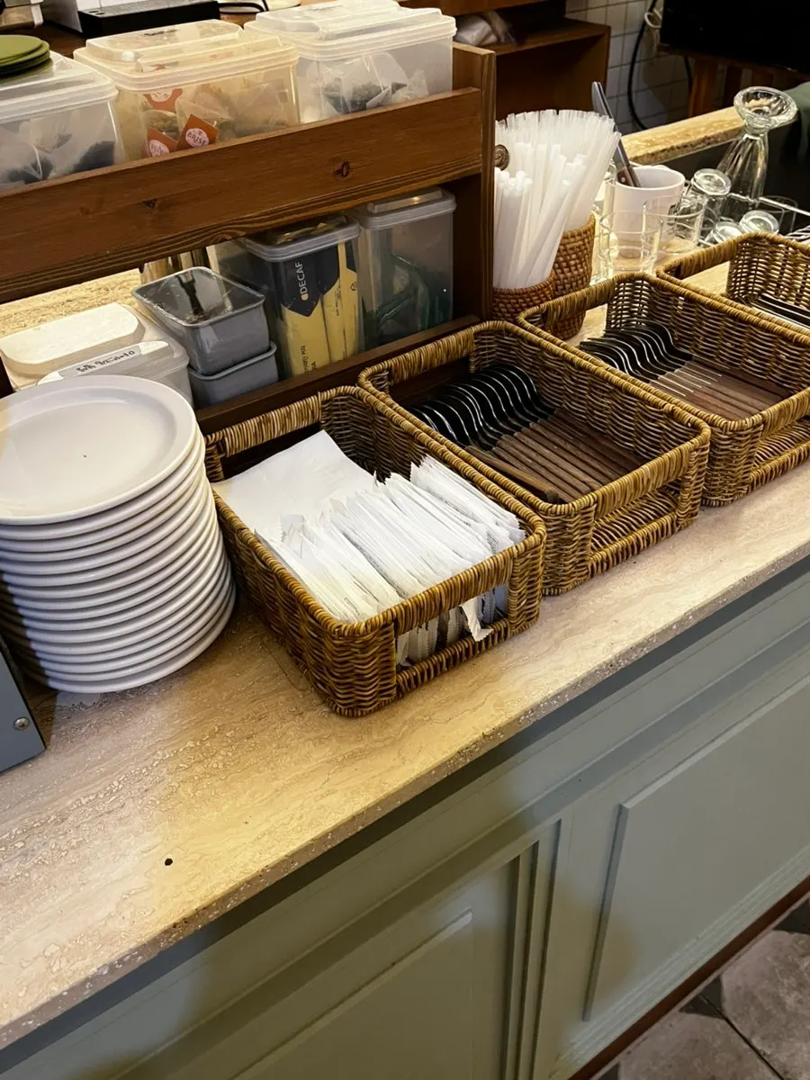 Self-bar with plates, cutlery, and water