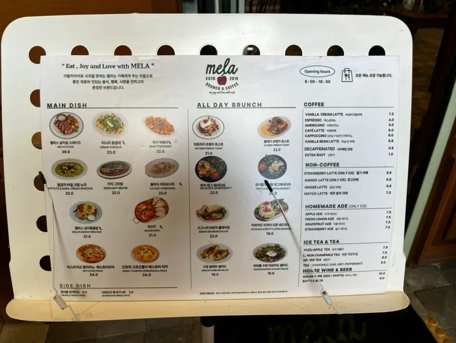 MELA Hongdae menu board listing main dishes and all-day brunch