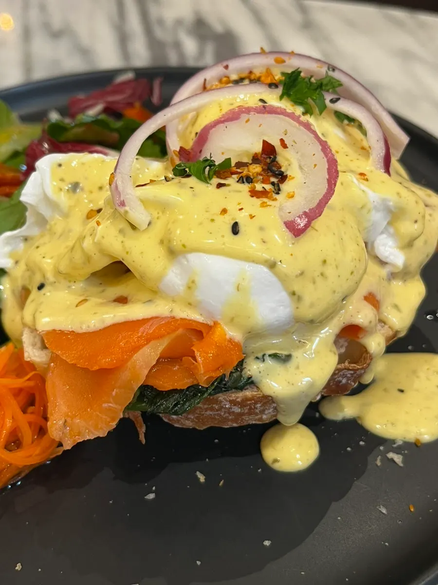 Salmon eggs Benedict topped with two poached eggs