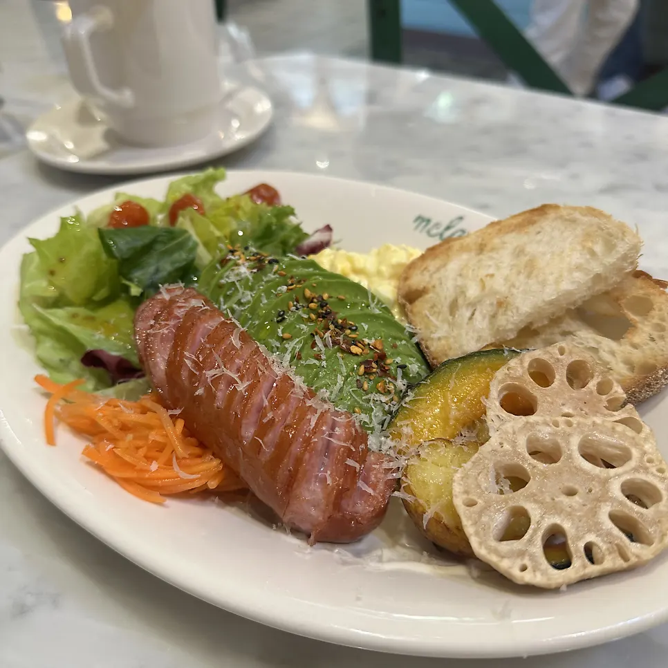 Signature brunch plate with vegetables and bread