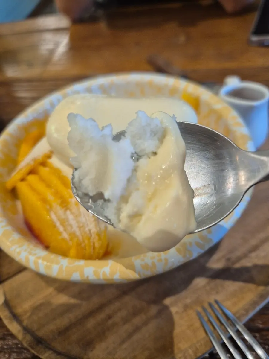 Bingsu piled generously with peach flesh