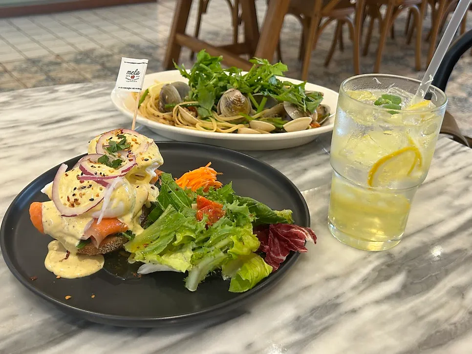 Two brunch plates and a lemonade on the table