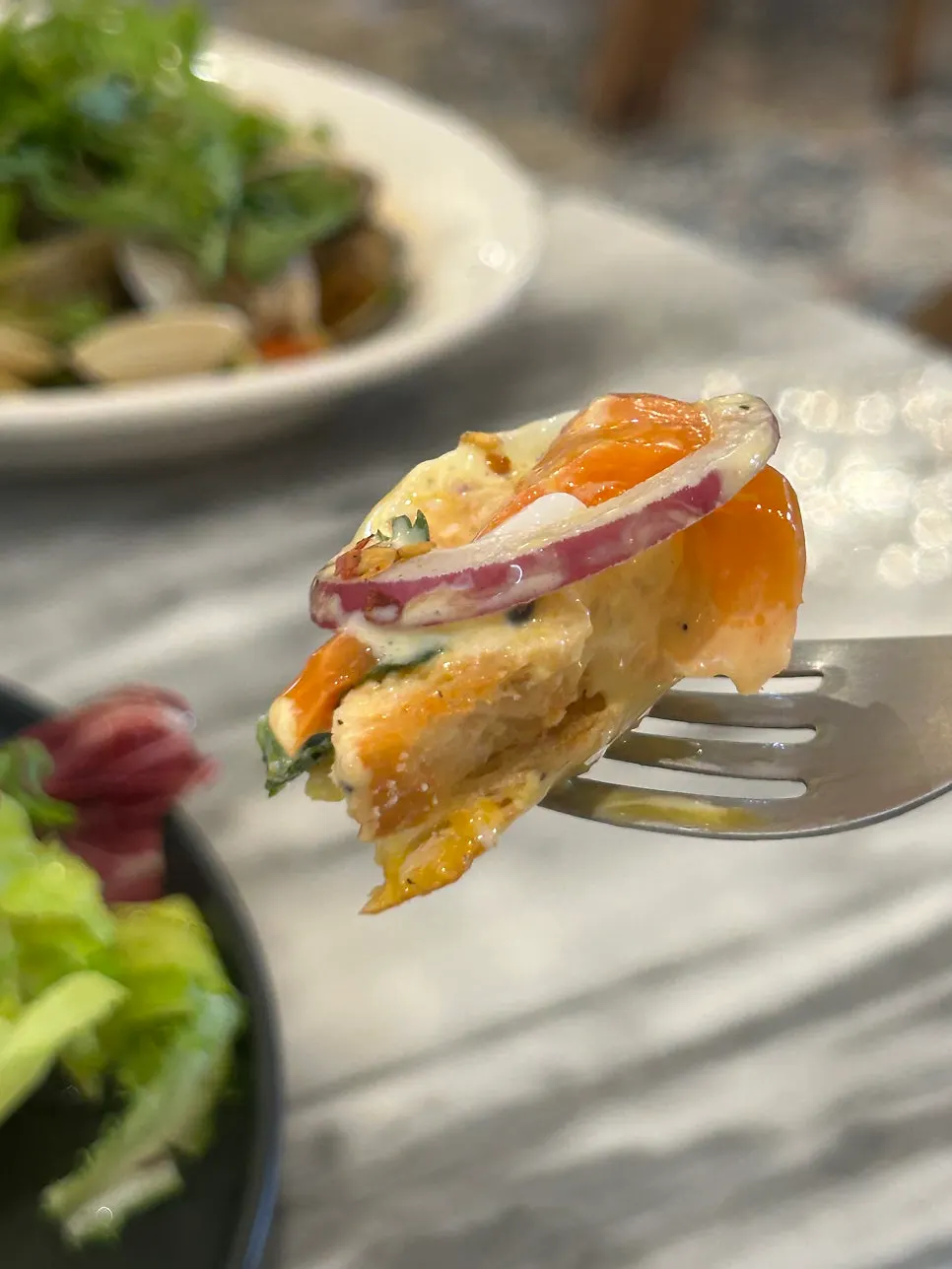 Salmon eggs Benedict with the soft-boiled egg broken open