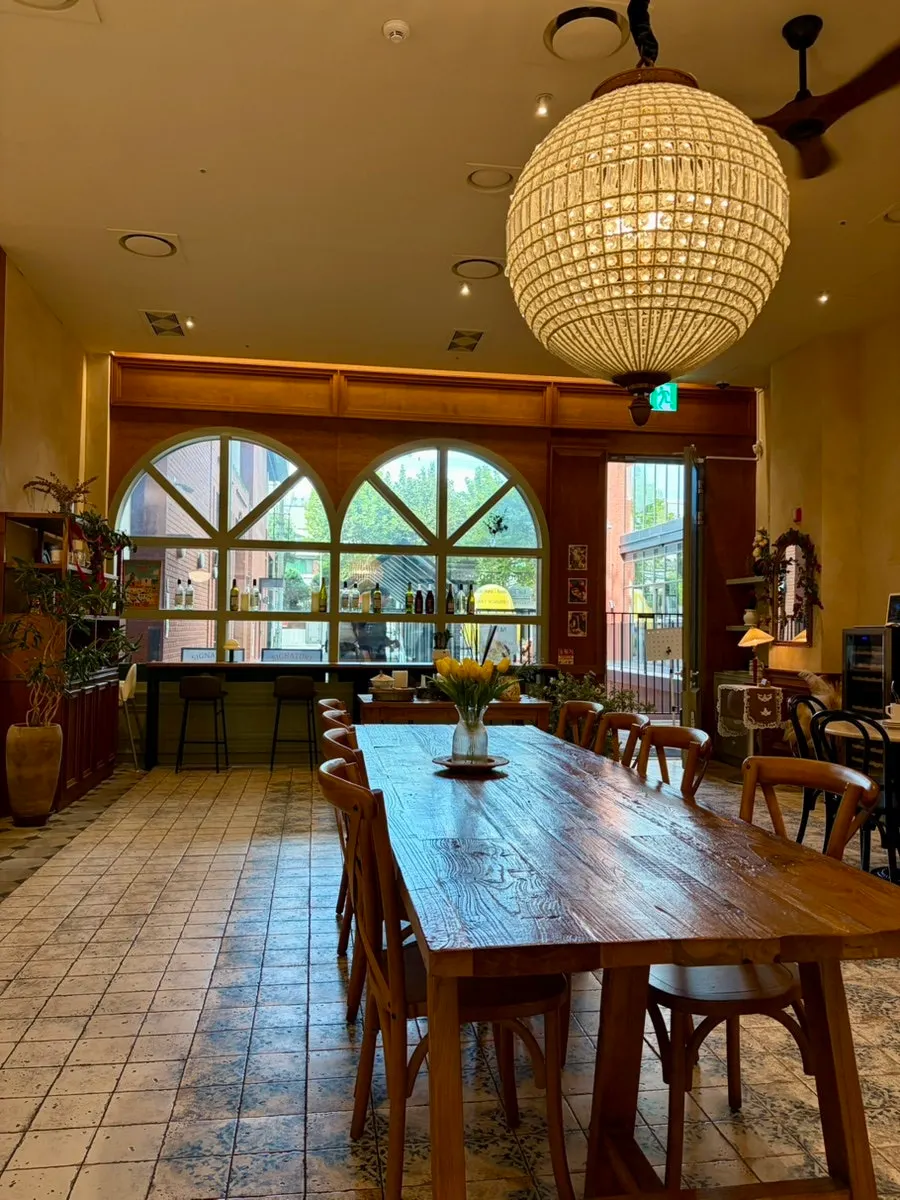 Interior of MELA Hongdae showing the European-style floor tiles
