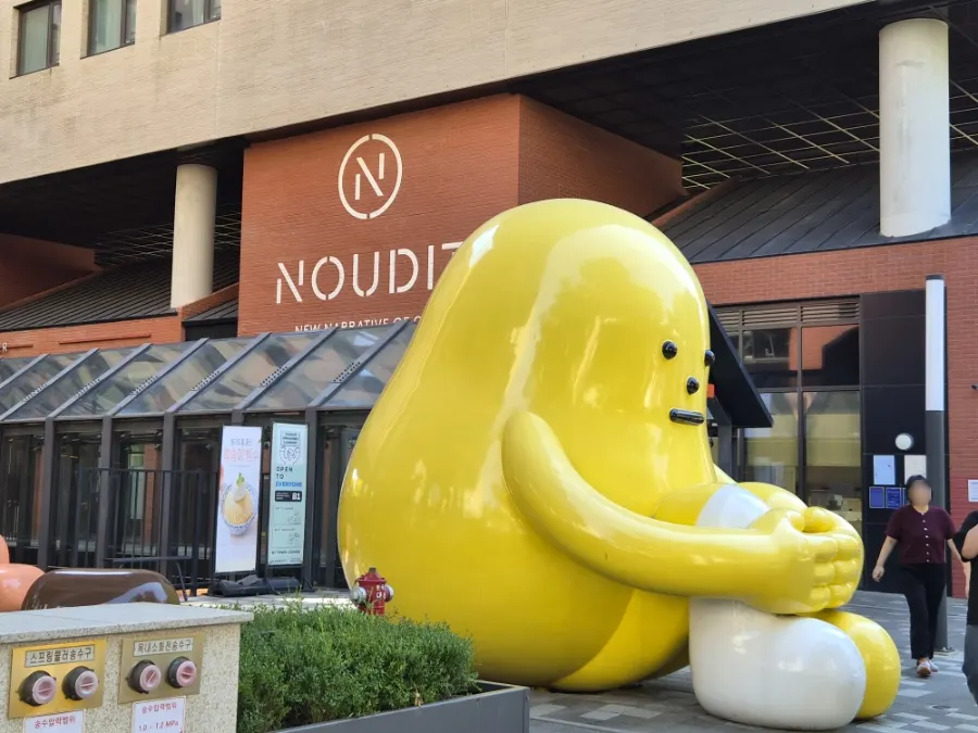 Exterior of MELA Hongdae on the first floor of the Nudit building