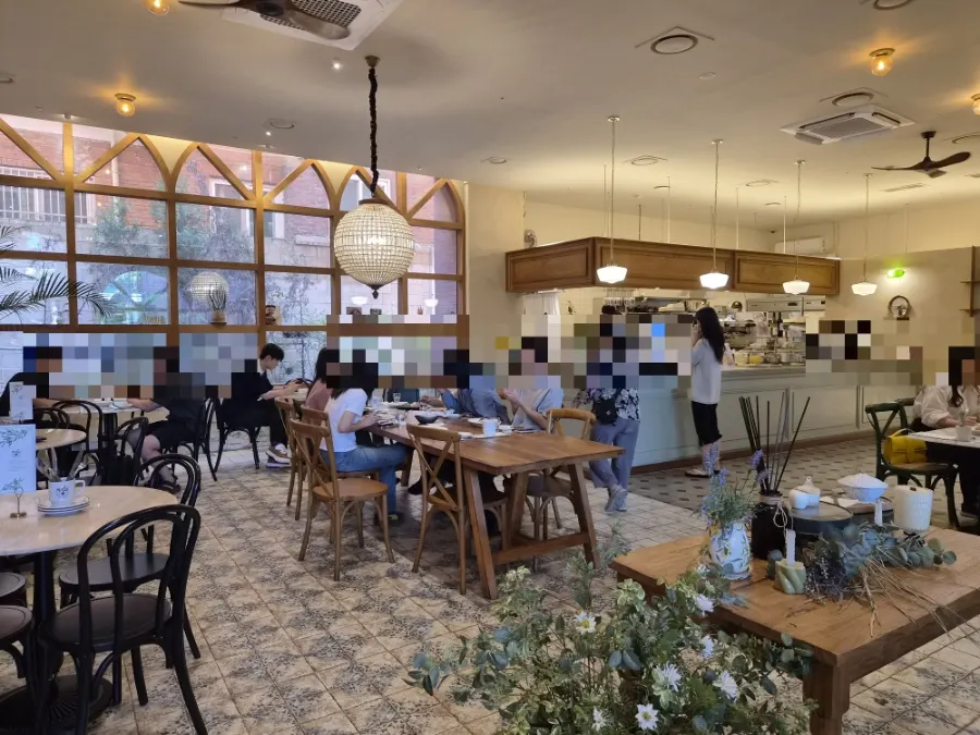 Interior of MELA Hongdae with group seating
