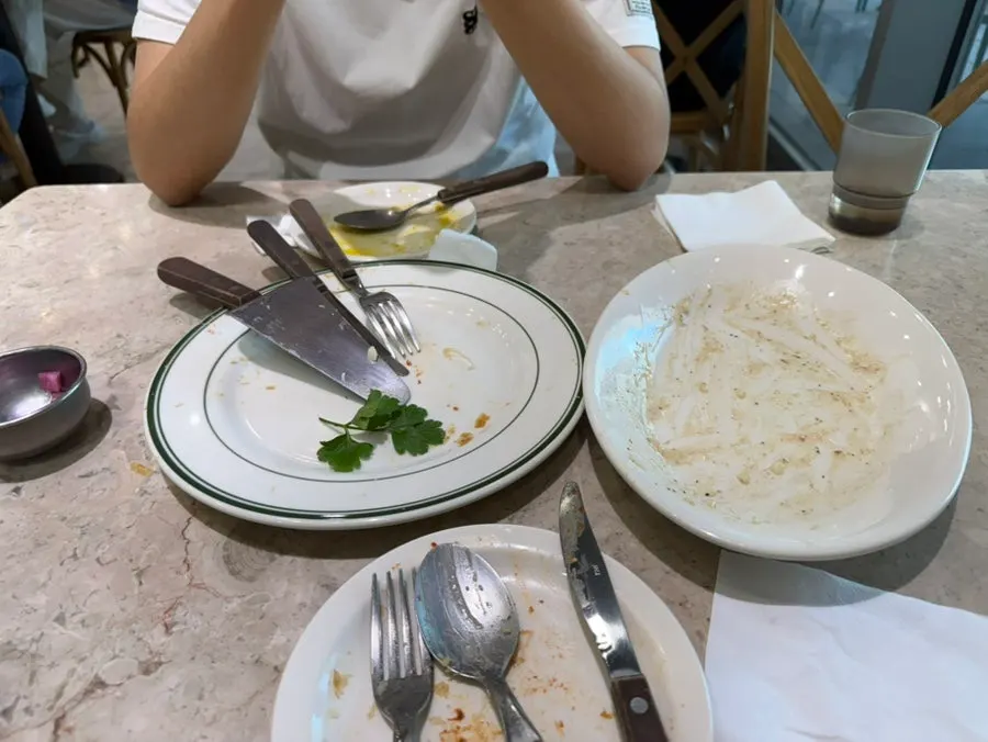 A plate of pickles received after asking staff