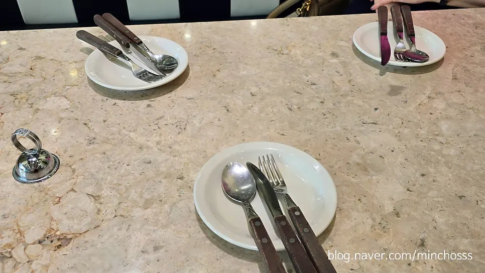 Table setting by the window at Mela before ordering