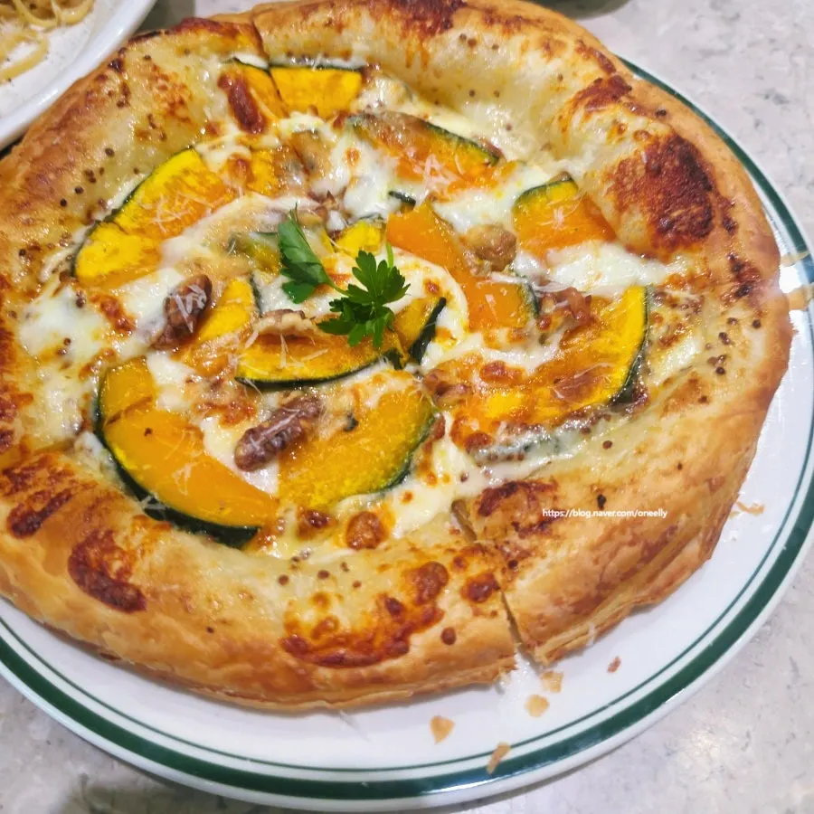 Golden-brown pumpkin gorgonzola pastry pizza